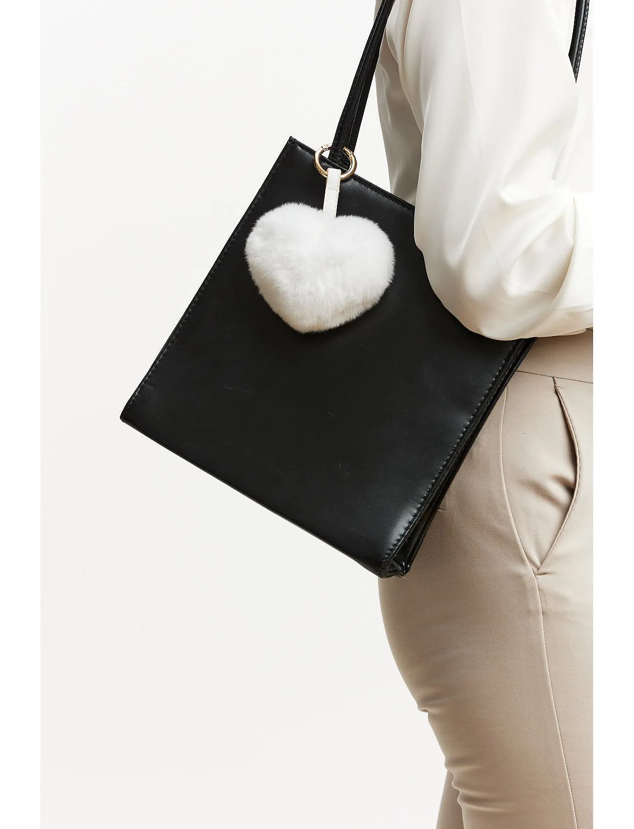 Bagcharm made of fur in the shape of a heart - white